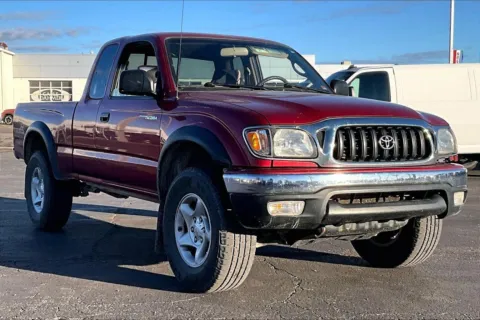 Red 2003 Toyota Tacoma ACC CAB 4WD V6 AT for sale in Topeka, KS