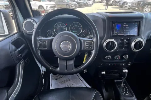 More photos of 2014 Jeep Wrangler Unlimited Sahara at Cable Dahmer Chevrolet of Kansas City, MO