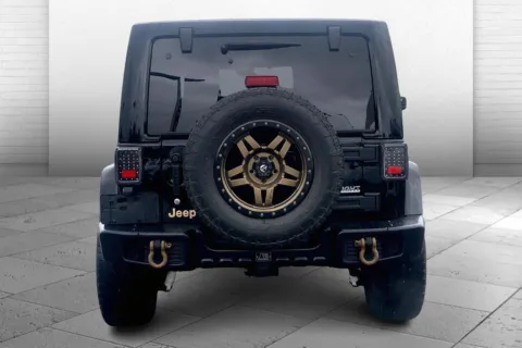 Another view of 2014 Jeep Wrangler Unlimited Dragon Edition for sale in Kansas City, MO at Cable Dahmer Chevrolet of Kansas City