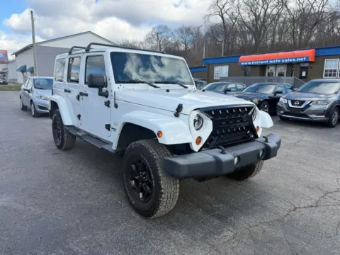 Another view of 2013 Jeep Wrangler Unlimited Sahara Sport Utility 4D for sale in Chillicothe, OH at Instant Auto Sales Chillicothe