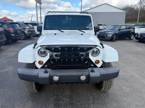 Photos of 2013 Jeep Wrangler Unlimited Sahara Sport Utility 4D for sale in Chillicothe, OH at Instant Auto Sales Chillicothe