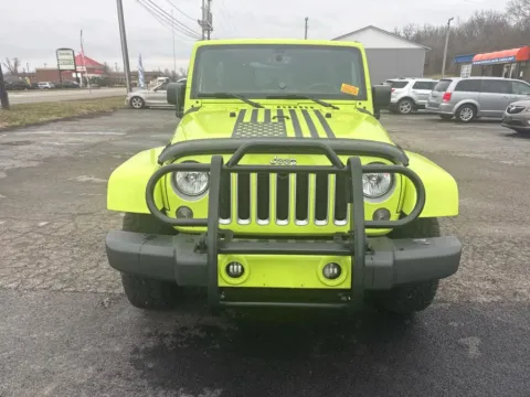 Photos of 2016 Jeep Wrangler Unlimited Sahara Sport Utility 4D for sale in Chillicothe, OH at Instant Auto Sales Chillicothe