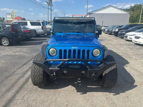 Photos of 2015 Jeep Wrangler Unlimited Sport SUV 4D for sale in Chillicothe, OH at Instant Auto Sales Chillicothe