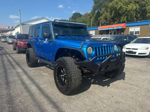 Another view of 2015 Jeep Wrangler Unlimited Sport SUV 4D for sale in Chillicothe, OH at Instant Auto Sales Chillicothe