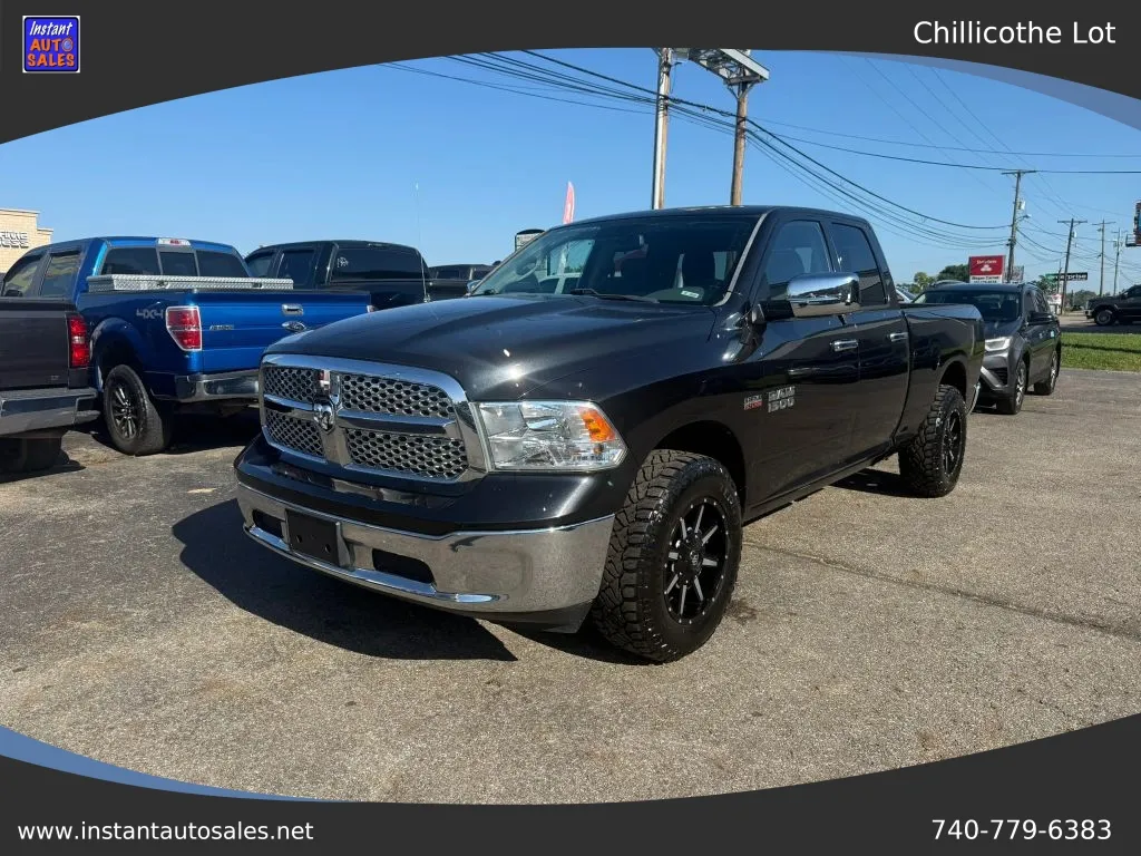 Black 2016 Ram 1500 Quad Cab SLT Pickup 4D 6 1/3 ft for sale in Chillicothe, OH