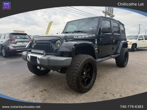 Black 2014 Jeep Wrangler Unlimited Sahara Sport Utility 4D for sale in Chillicothe, OH