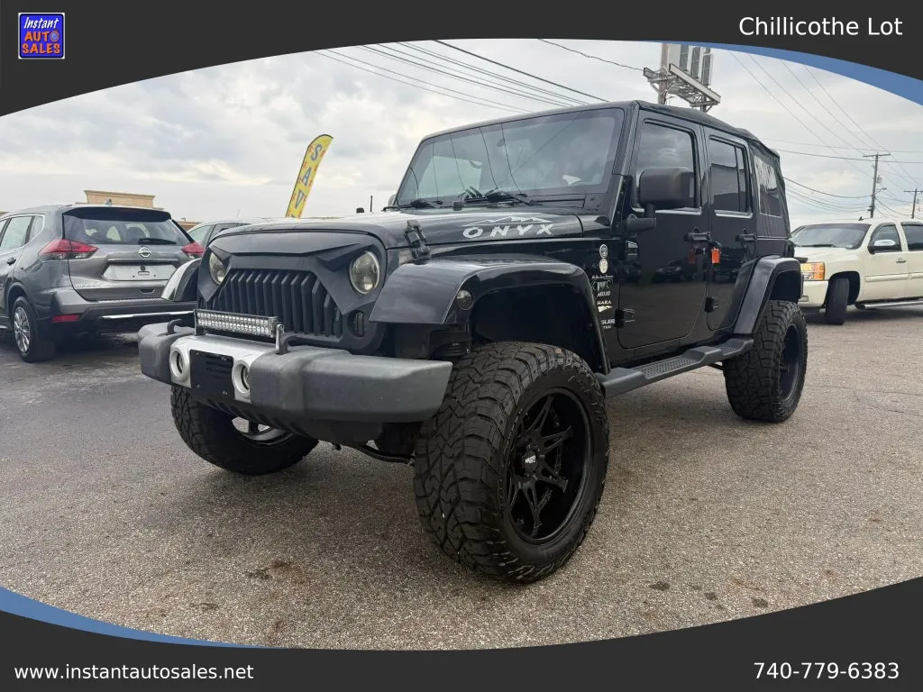 Black 2014 Jeep Wrangler Unlimited Sahara Sport Utility 4D for sale in Chillicothe, OH
