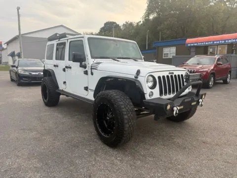 Another view of 2015 Jeep Wrangler Unlimited Altitude Sport Utility 4D for sale in Chillicothe, OH at Instant Auto Sales Chillicothe