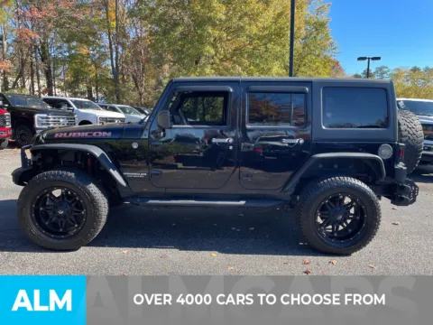 Another view of 2009 Jeep Wrangler Unlimited Rubicon for sale in Marietta, GA at ALM Ford Marietta