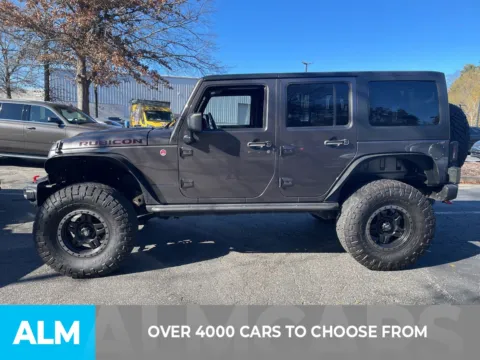 Another view of 2014 Jeep Wrangler Unlimited Rubicon for sale in Marietta, GA at ALM Ford Marietta