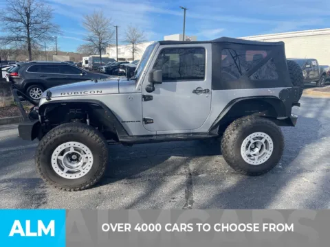 Another view of 2013 Jeep Wrangler Rubicon for sale in Marietta, GA at ALM Ford Marietta