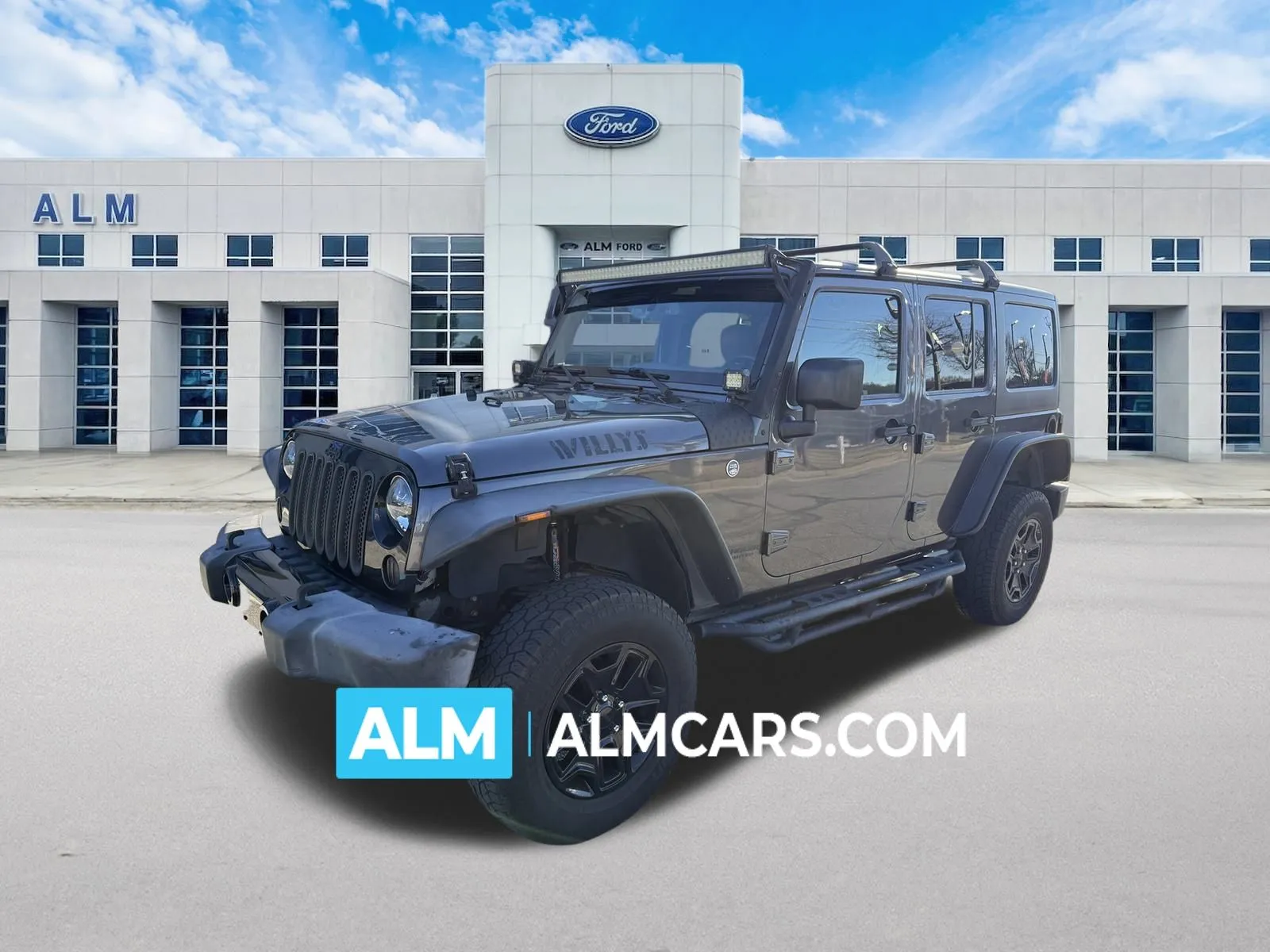 Gray 2016 Jeep Wrangler Unlimited Willys for sale in Marietta, GA