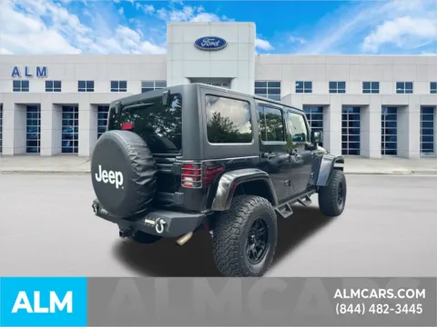 More photos of 2013 Jeep Wrangler Unlimited Sahara at ALM Ford Marietta, GA