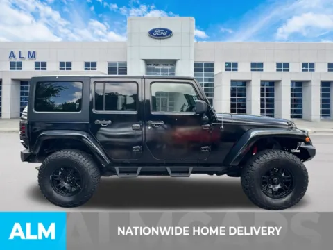 More photos of 2013 Jeep Wrangler Unlimited Sahara at ALM Ford Marietta, GA