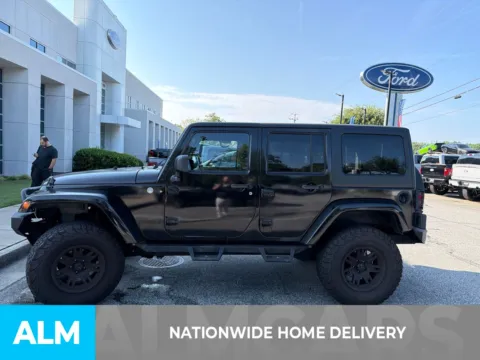 More photos of 2013 Jeep Wrangler Unlimited Sahara at ALM Ford Marietta, GA