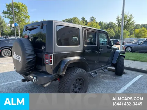 More photos of 2013 Jeep Wrangler Unlimited Sahara at ALM Ford Marietta, GA
