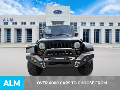 Photos of 2013 Jeep Wrangler Unlimited Sahara for sale in Marietta, GA at ALM Ford Marietta