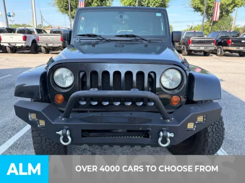 Photos of 2013 Jeep Wrangler Unlimited Sahara for sale in Marietta, GA at ALM Ford Marietta