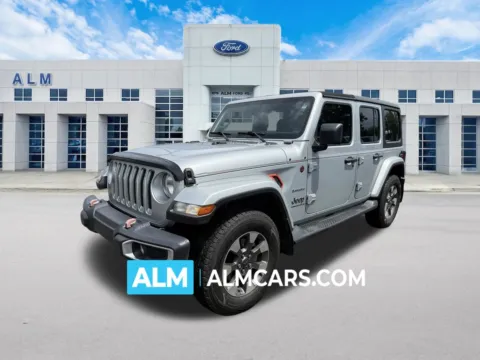 Silver 2023 Jeep Wrangler Sahara for sale in Marietta, GA