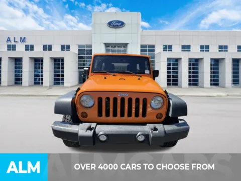 Photos of 2013 Jeep Wrangler Unlimited Sport for sale in Marietta, GA at ALM Ford Marietta