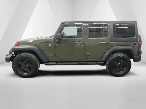 More photos of 2015 Jeep Wrangler Unlimited Sport at Ironton Automotive, OH