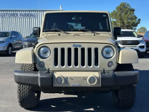 Photos of 2017 Jeep Wrangler Unlimited Sahara Sport Utility 4D for sale in Las Cruces, NM at L&L Auto Sales