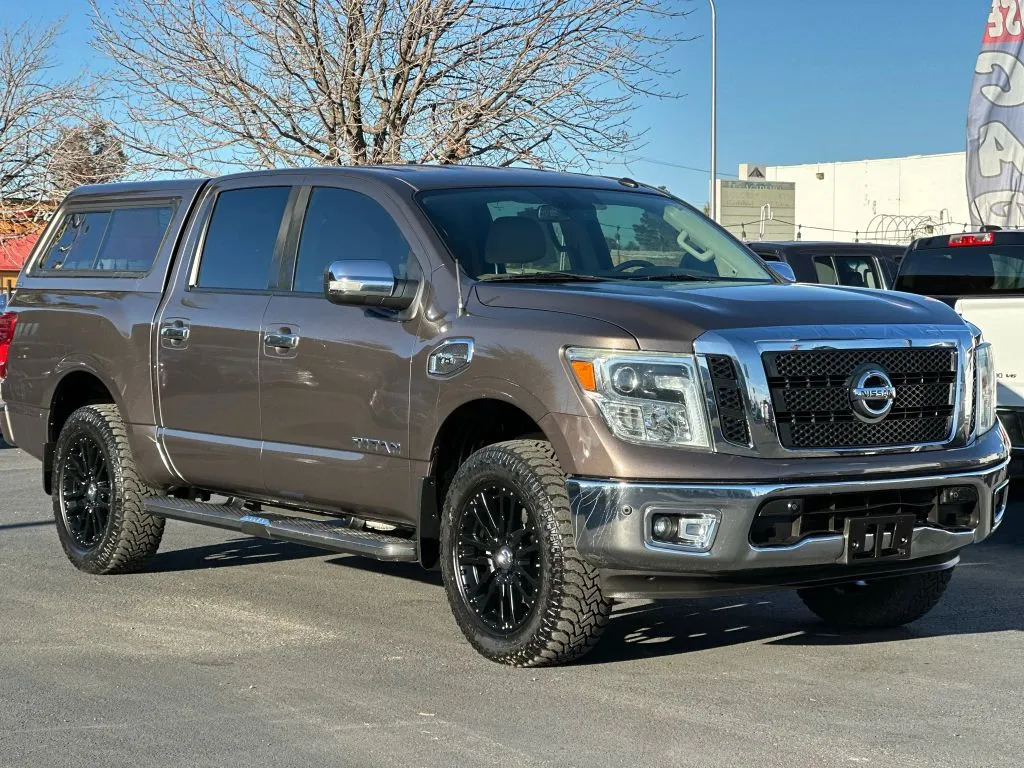 Brown 2017 Nissan Titan Crew Cab SL Pickup 4D 5 1/2 ft for sale in Las Cruces, NM