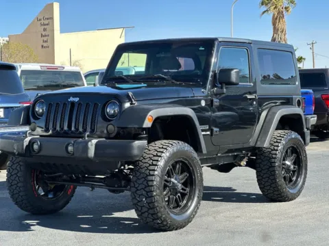 Another view of 2013 Jeep Wrangler Sport SUV 2D for sale in Las Cruces, NM at L&L Auto Sales
