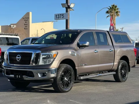 Another view of 2017 Nissan Titan Crew Cab SL Pickup 4D 5 1/2 ft for sale in Las Cruces, NM at L&L Auto Sales