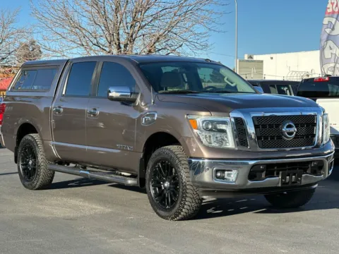 Brown 2017 Nissan Titan Crew Cab SL Pickup 4D 5 1/2 ft for sale in Las Cruces, NM