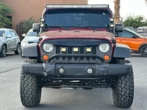 Photos of 2012 Jeep Wrangler Sport SUV 2D for sale in Las Cruces, NM at L&L Auto Sales