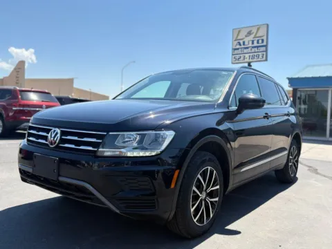 Another view of 2021 Volkswagen Tiguan SE 4MOTION Sport Utility 4D for sale in Las Cruces, NM at L&L Auto Sales