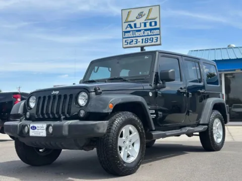 Another view of 2014 Jeep Wrangler Unlimited Sport SUV 4D for sale in Las Cruces, NM at L&L Auto Sales