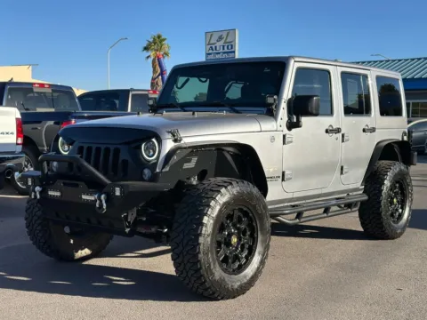 Another view of 2015 Jeep Wrangler Unlimited Sahara Sport Utility 4D for sale in Las Cruces, NM at L&L Auto Sales