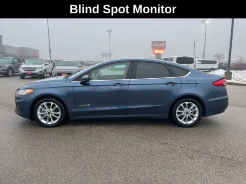 Photos of 2019 Ford Fusion Hybrid SE for sale in Cedar Rapids, IA at Cassill Motors