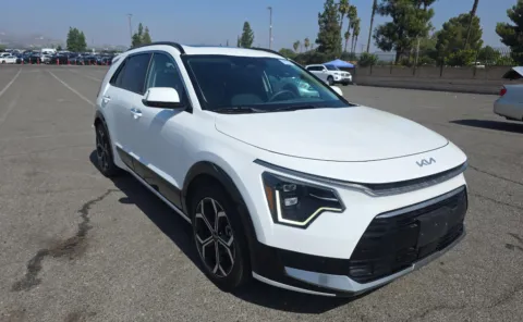 Photos of 2023 Kia Niro SX Touring for sale in Cedar Rapids, IA at Cassill Motors