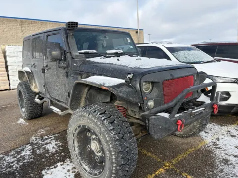 More photos of 2013 Jeep Wrangler Unlimited Sahara at Cassill Motors, IA