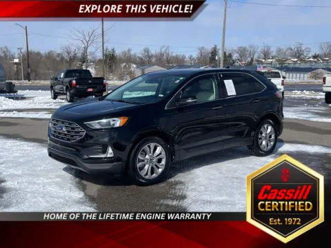 Black 2022 Ford Edge Titanium for sale in Cedar Rapids, IA