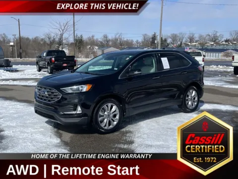 Black 2022 Ford Edge Titanium for sale in Cedar Rapids, IA