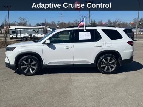 Photos of 2023 Honda Pilot Touring for sale in Cedar Rapids, IA at Cassill Motors