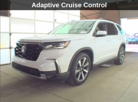 Photos of 2023 Honda Pilot Touring for sale in Cedar Rapids, IA at Cassill Motors