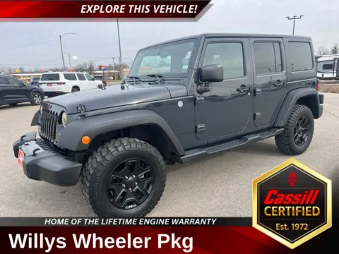 Gray 2016 Jeep Wrangler Unlimited Willys for sale in Cedar Rapids, IA