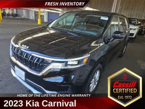 Black 2023 Kia Carnival LX for sale in Cedar Rapids, IA