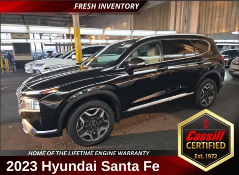 Black 2023 Hyundai Santa Fe Hybrid SEL Premium for sale in Cedar Rapids, IA