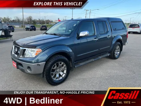 Gray 2014 Nissan Frontier SL for sale in Cedar Rapids, IA