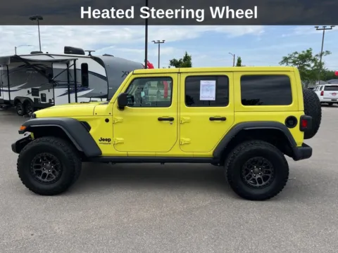Photos of 2022 Jeep Wrangler Unlimited High Tide for sale in Cedar Rapids, IA at Cassill Motors