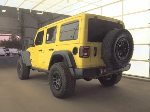 Photos of 2022 Jeep Wrangler Unlimited High Tide for sale in Cedar Rapids, IA at Cassill Motors