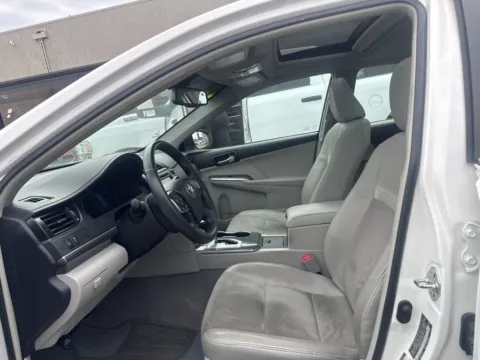 Photos of 2014 Toyota Camry Hybrid LE for sale in Cedar Rapids, IA at Cassill Motors