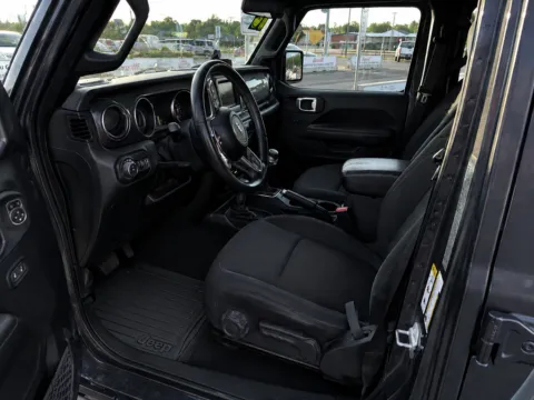 Photos of 2018 Jeep Wrangler Unlimited Sahara for sale in Cedar Rapids, IA at Cassill Motors