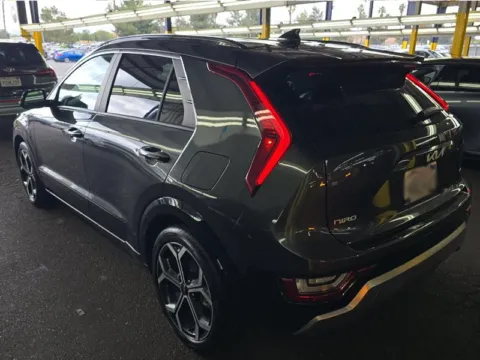 Photos of 2023 Kia Niro SX Touring for sale in Cedar Rapids, IA at Cassill Motors